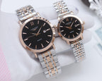 Longines quartz wristwatch with rose gold metal bracelet and white dial, Roman numerals