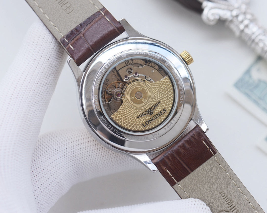 Longines watch caseback with exposed movement on brown leather strap, engraved metal