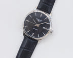 Longines watch with black leather strap, silver-tone case, dark blue dial and date window