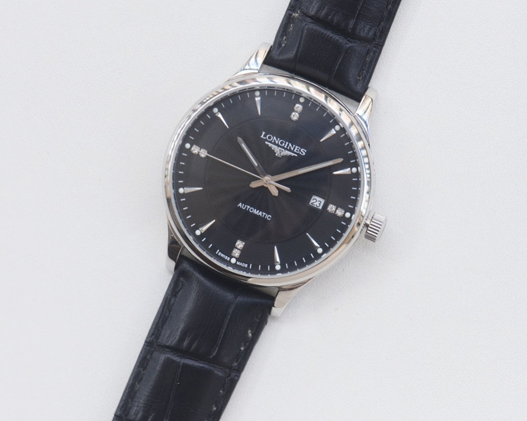 Longines watch with black leather strap, silver-tone case, dark blue dial and date window