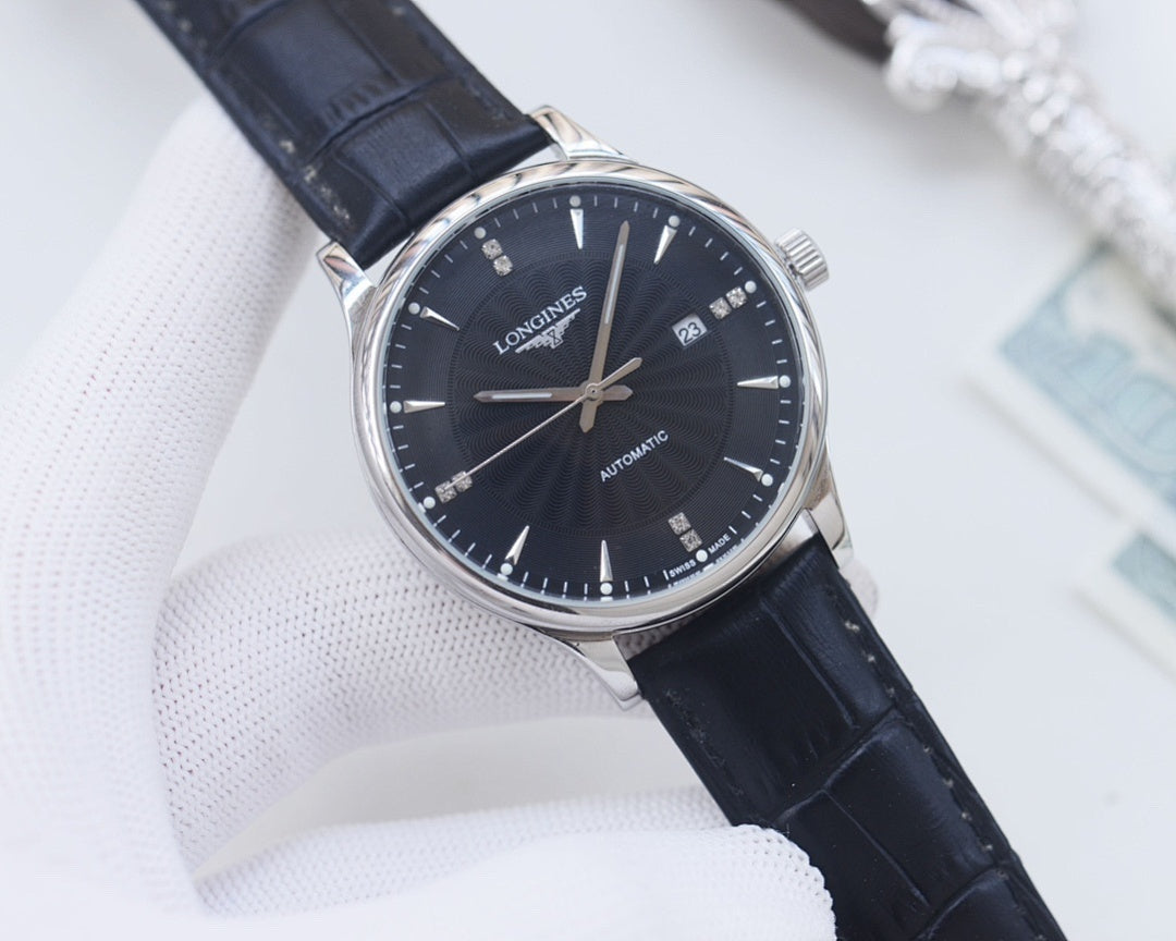 Longines watch with navy leather strap, silver-tone case, dark blue dial and date window