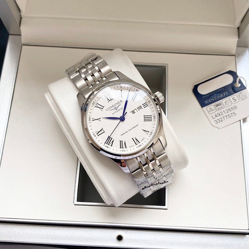 Longines watch on white stand, silver steel bracelet, white dial with Roman numerals