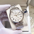 Longines watch, light dial with Roman numerals, steel bracelet, date window at 25