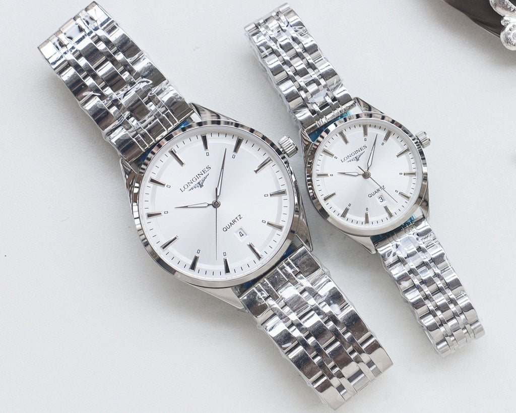 Quartz wristwatches with white dial and silver metal link bracelet, two-pack.