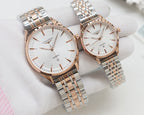 Quartz wristwatches with white dial and silver metal bracelet, rose-gold tone cases, two-pack.