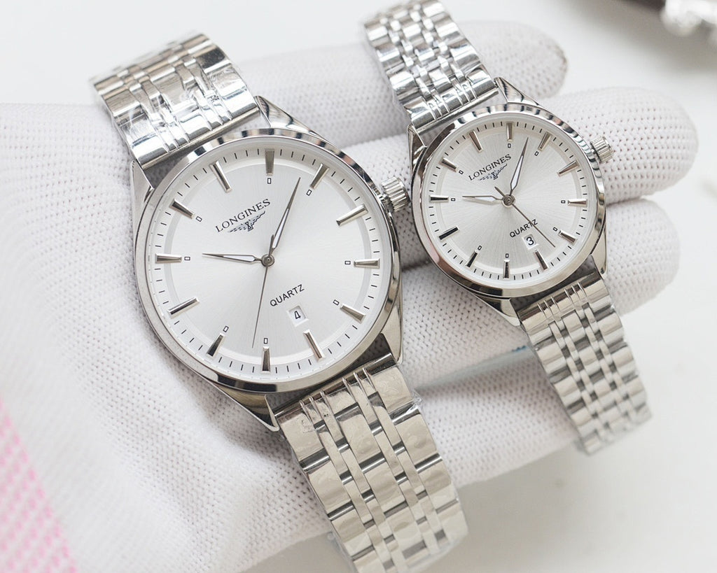 Quartz wristwatches with white dial and silver metal link bracelet, two-pack.