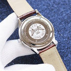 Longines Master Collection watch caseback on brown leather strap
