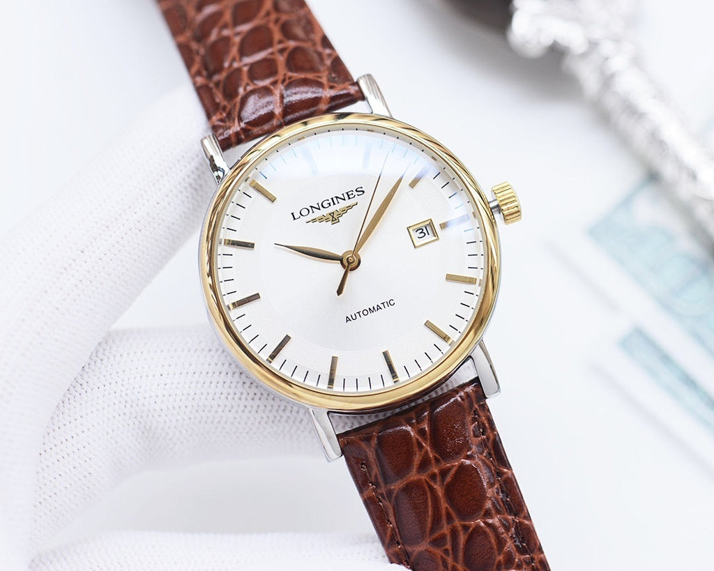 Longines watch with gold-tone bezel, white dial, brown leather strap, date window at 3