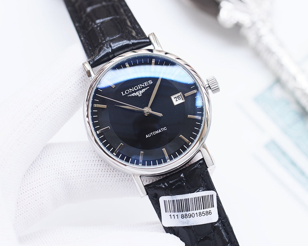 Longines watch with silver case, dark blue dial, black leather strap, date window at 3