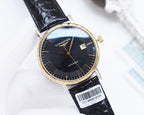 Longines watch with gold-tone bezel, dark blue dial, black leather strap, barcode tag on strap