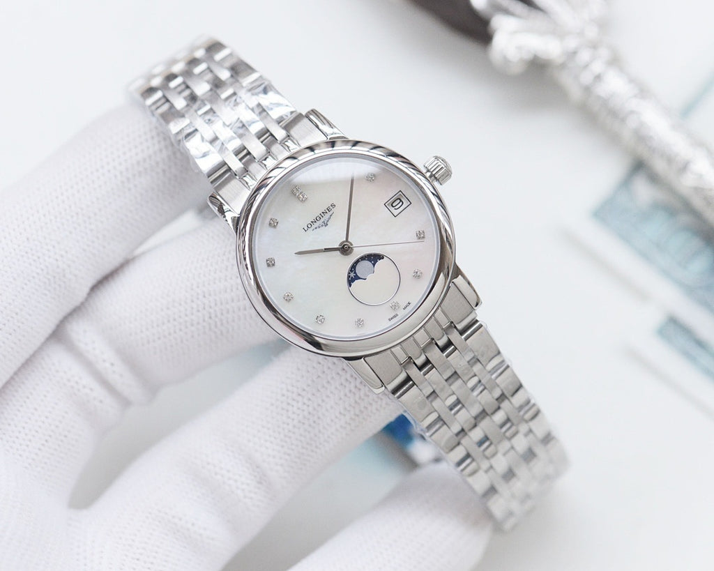 Longines watch, silver metal bracelet, white dial with moon-phase display.