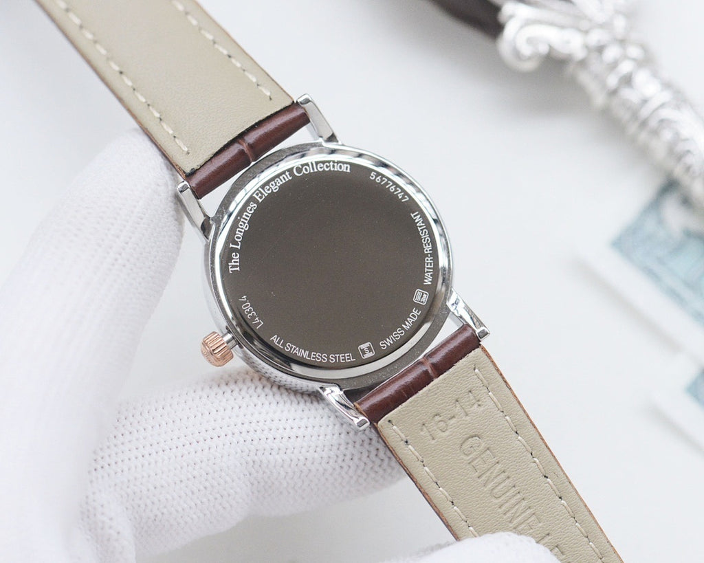 Longines watch, beige leather strap, stainless-steel case with engraved back.