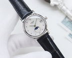 Longines watch, black leather strap, silver case, white dial with moon-phase.