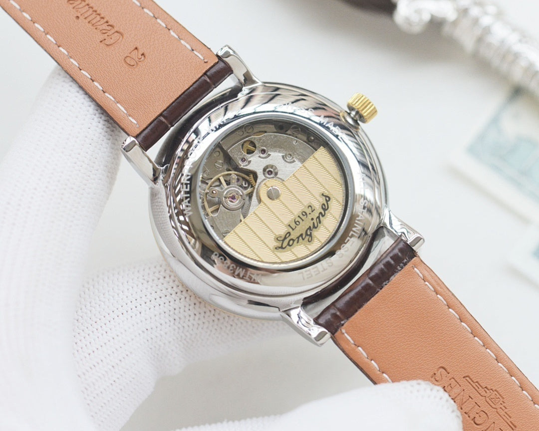 Longines automatic watch caseback, silver back plate, tan leather strap