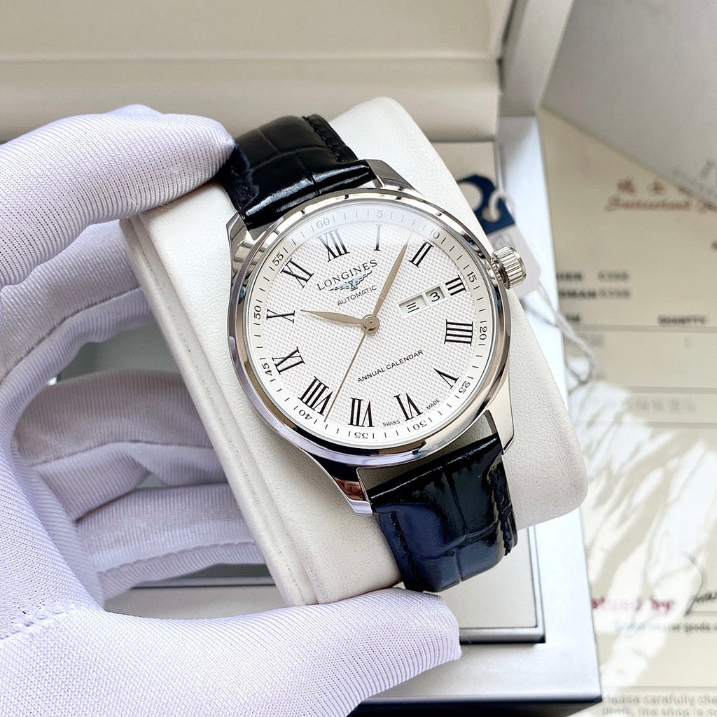 Longines wristwatch with white dial, silver-tone case, black leather strap, Roman numerals