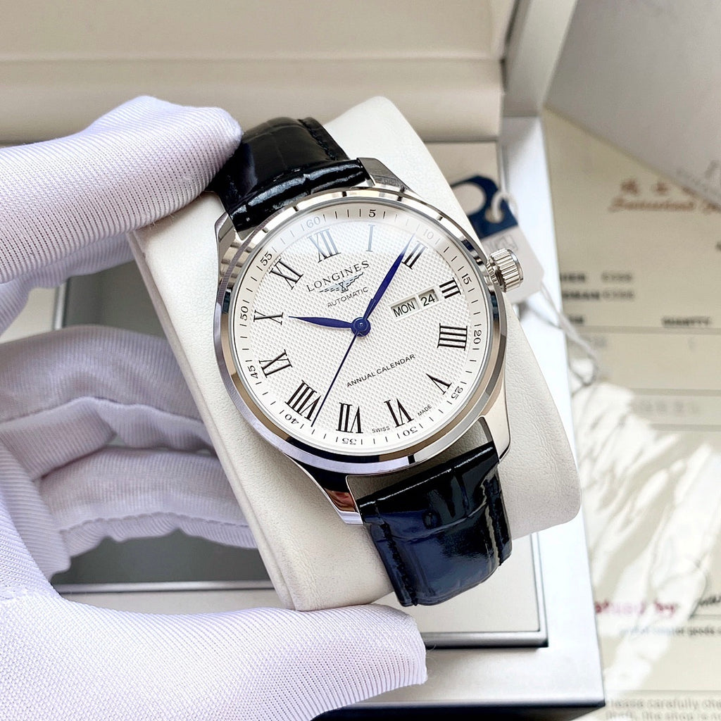 Longines wristwatch with white dial, gold-tone case, brown leather strap, Roman numerals