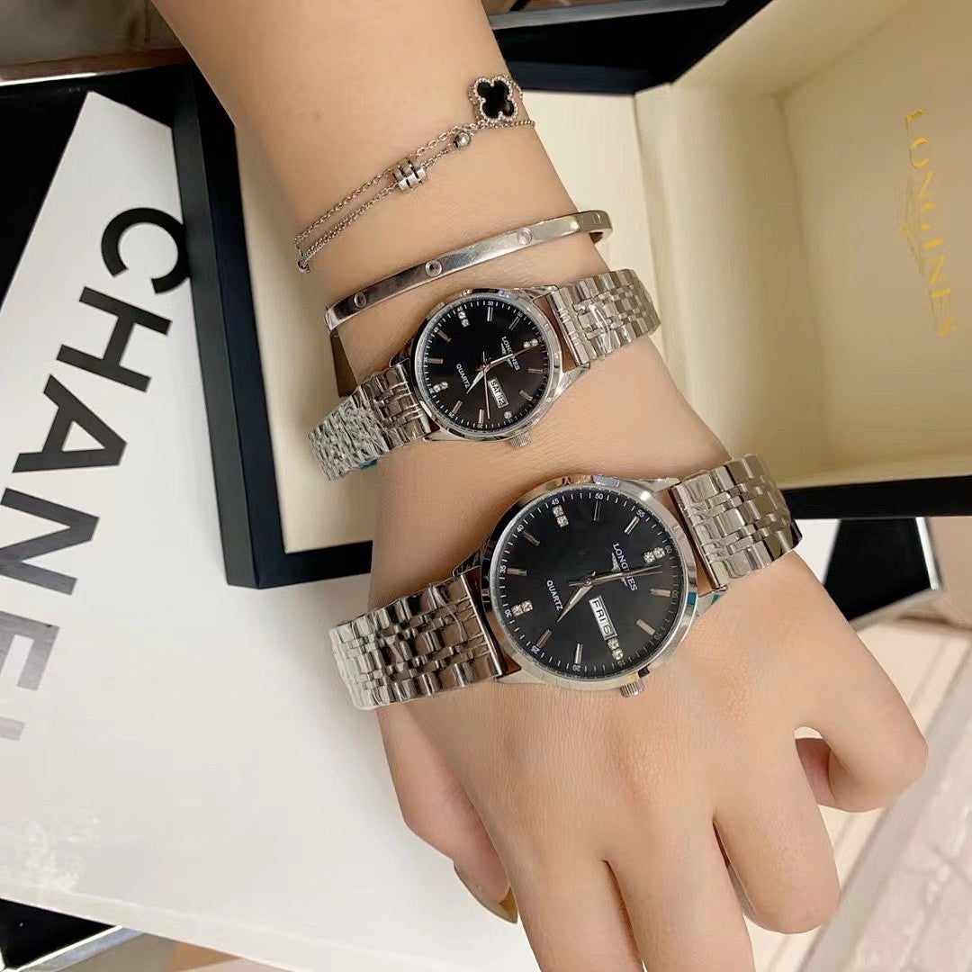 Longines watch duo on wrists, black dial with silver metal link bracelets