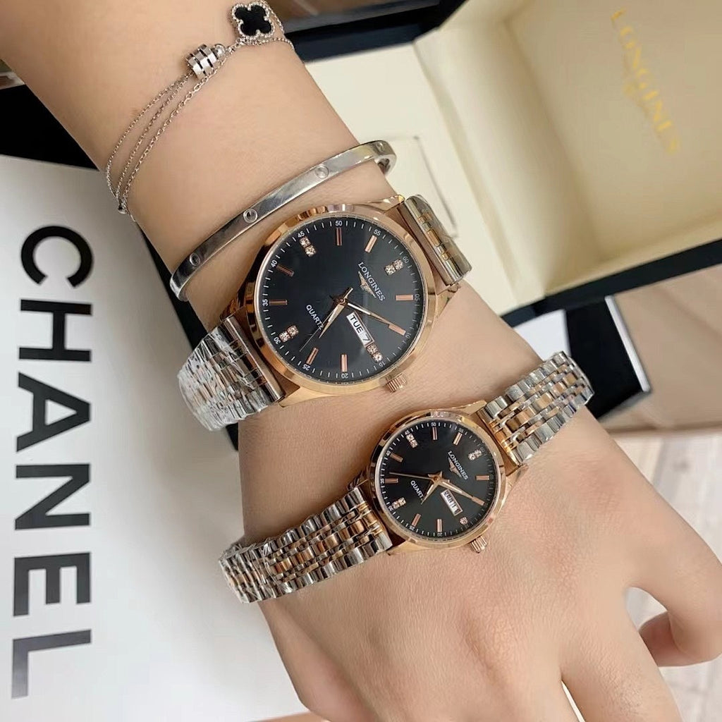 Longines watch pair on arm, black dial silver metal bracelets