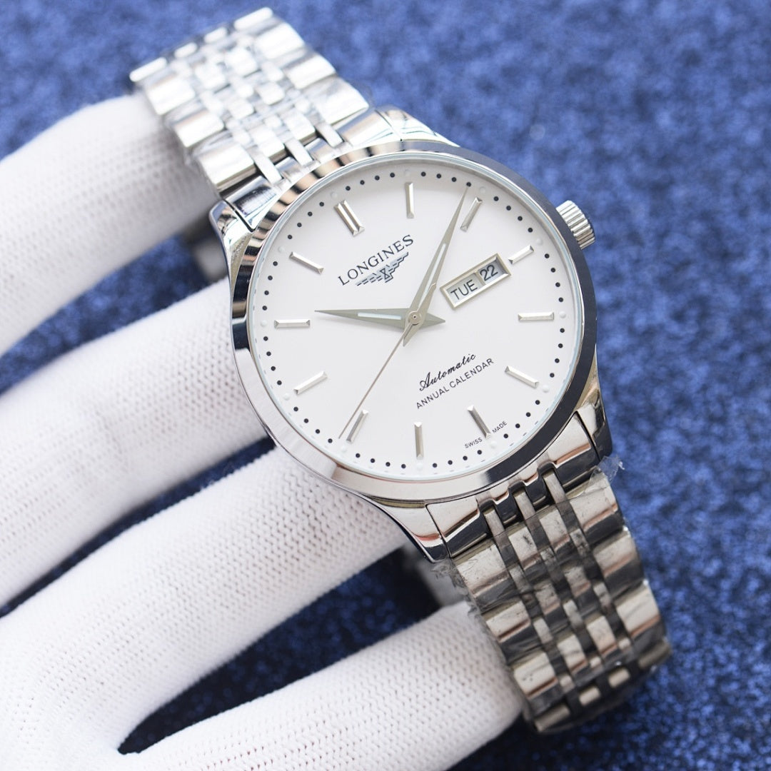 Longines watch with white dial and two-tone metal bracelet, date window at 3