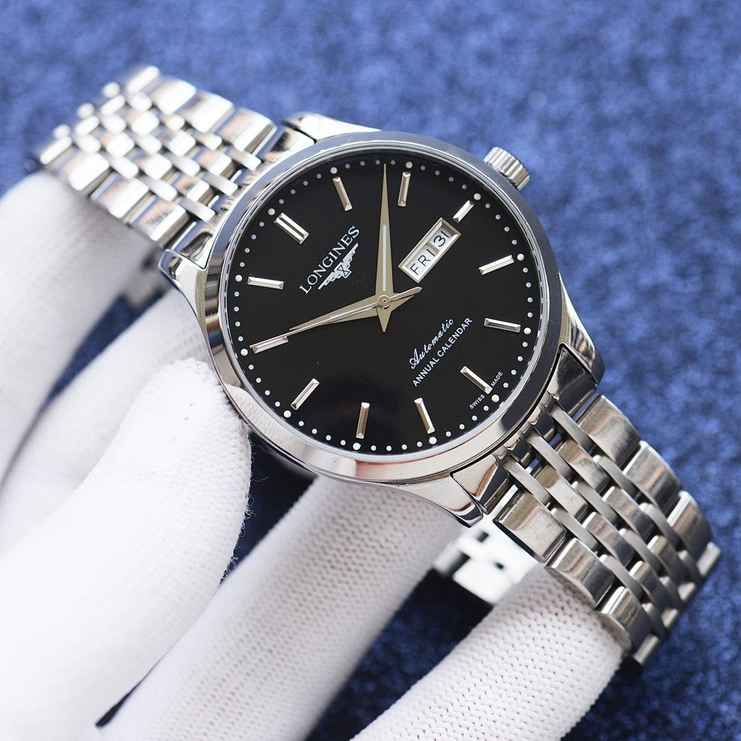 Longines watch with black dial and steel bracelet, date window at 3