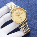 Longines watch with gold-tone dial and two-tone metal bracelet, date window at 24