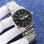 Longines watch with black dial and steel bracelet, date window at 3