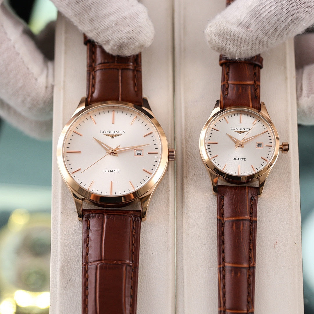 Two Longines quartz watches with brown leather straps and light dials, rose hands