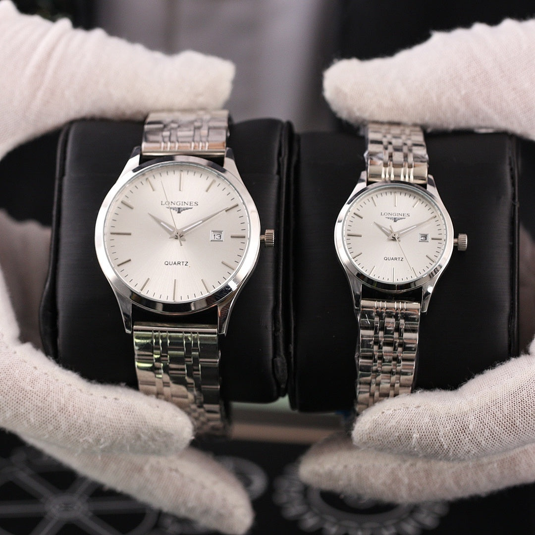 Two Longines quartz watches with silver-tone metal bracelets and white dials, date window