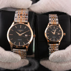 Two Longines quartz watches with rose-tone metal bracelets and dark dials, date window visible