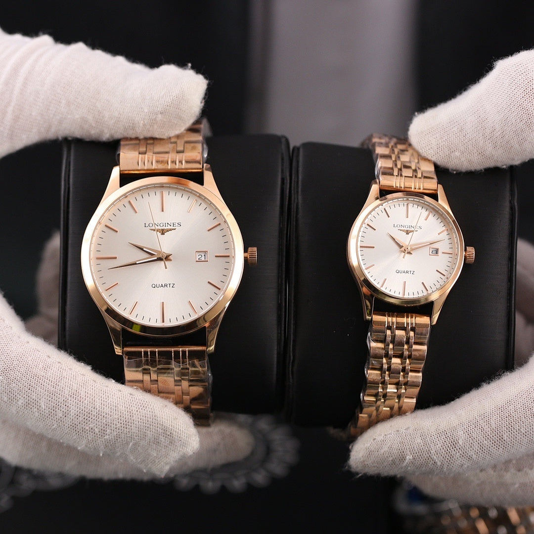 Two Longines quartz watches with rose-tone metal bracelets and light dials, date window visible