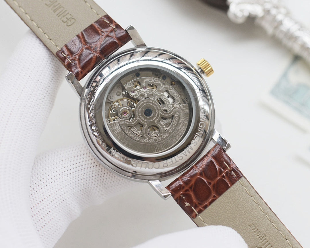 Automatic wristwatch with brown leather strap, exposed skeleton caseback