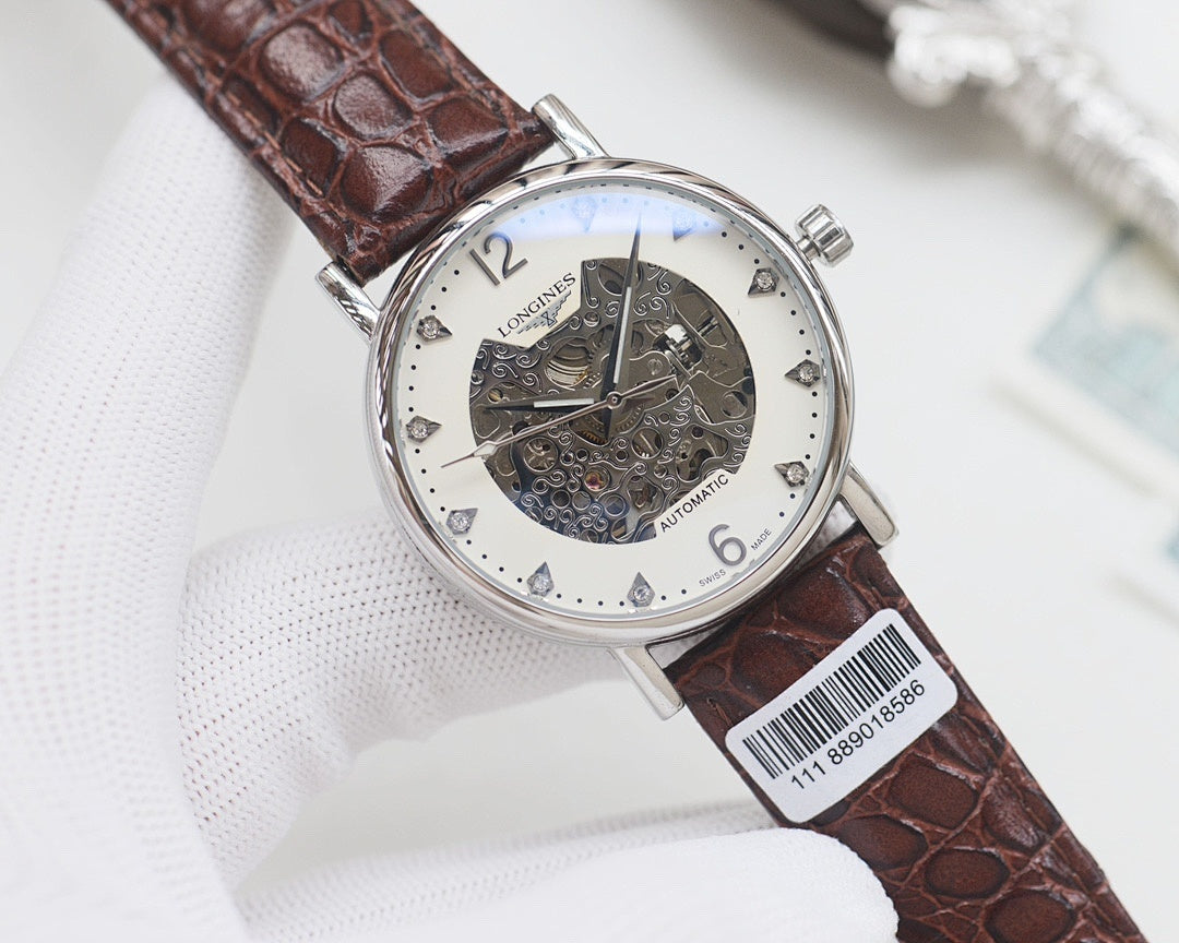 Automatic wristwatch with brown leather strap, silver case, white skeleton dial