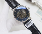 Automatic wristwatch with black leather strap, silver case, dark skeleton dial