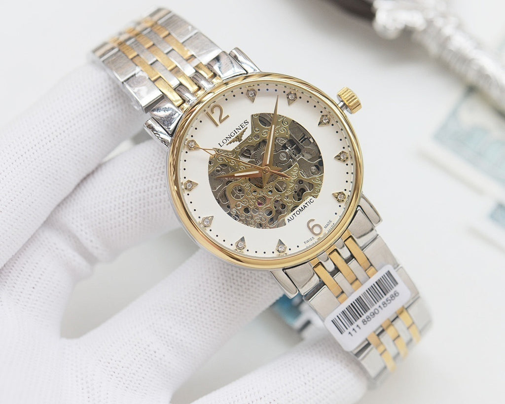Longines automatic wristwatch with two-tone metal bracelet, white skeleton dial