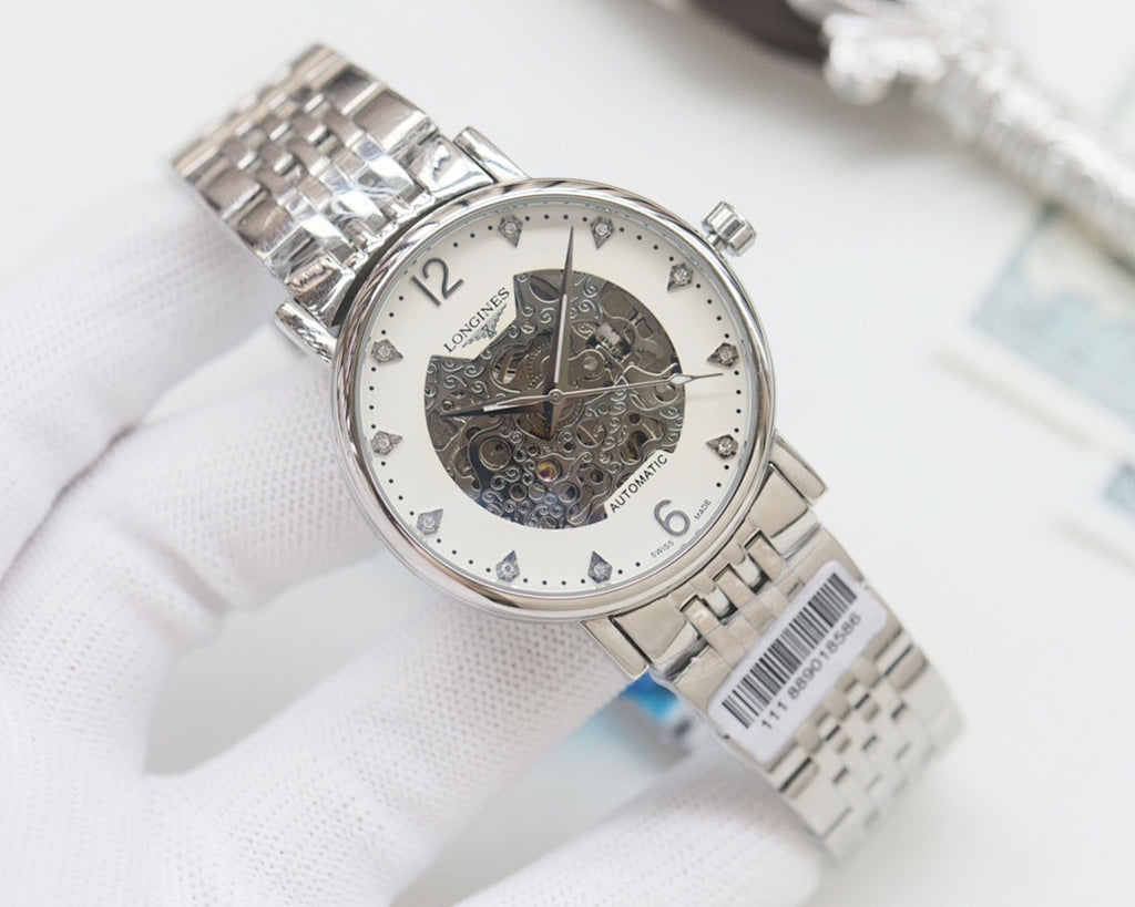 Automatic wristwatch with silver metal bracelet, white skeleton dial
