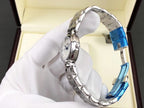 Longines watch side view with blue accent strap and silver bracelet links