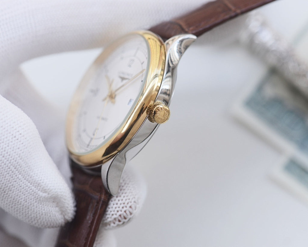 Longines watch with brown leather strap and two-tone case, crown detail