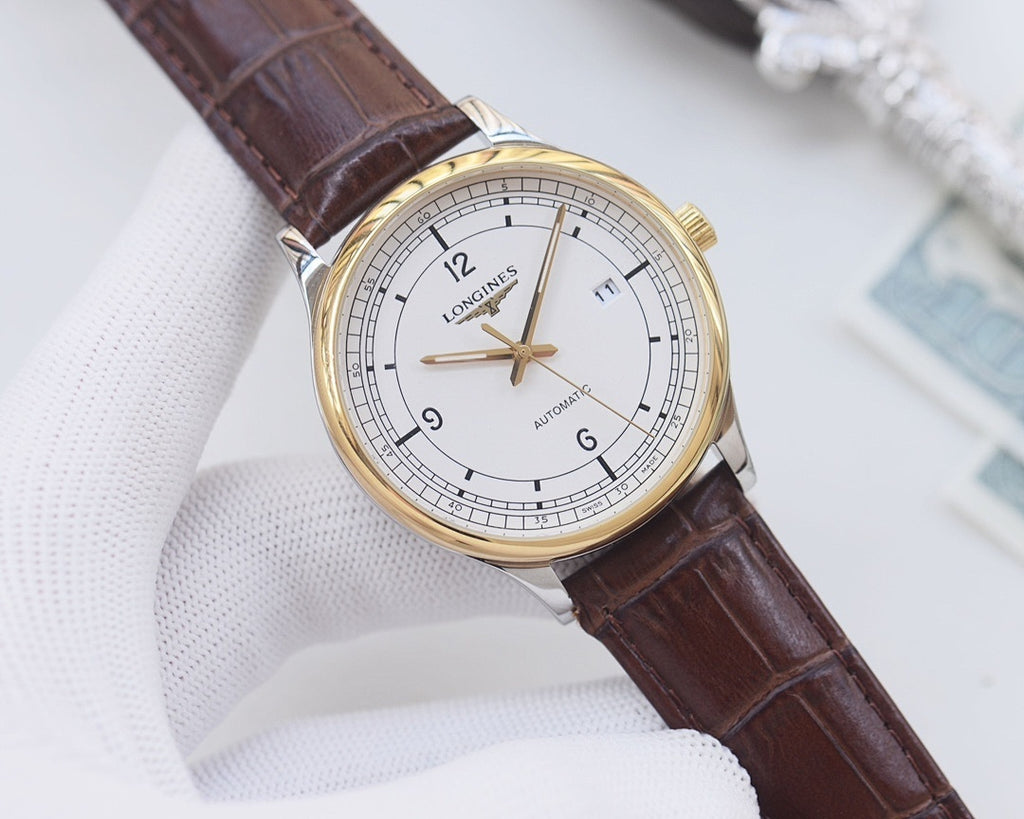 Longines watch with brown leather strap and gold-tone bezel, white dial