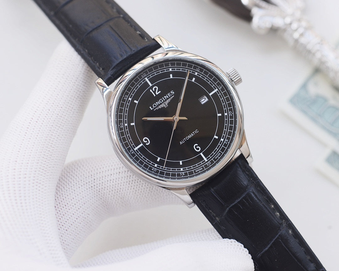 Longines watch with dark leather strap, silver case and black dial