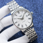 Two-tone wristwatch with white dial, roman numeral hour markers, steel bracelet