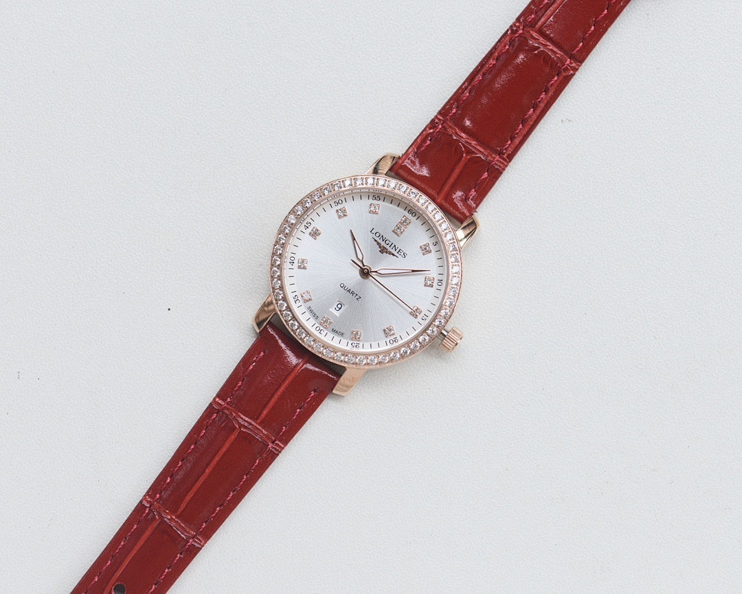 Wristwatch with red leather strap, white dial and crystal-studded bezel