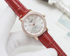Wristwatch with red leather strap and rose-gold case, white crystal bezel dial