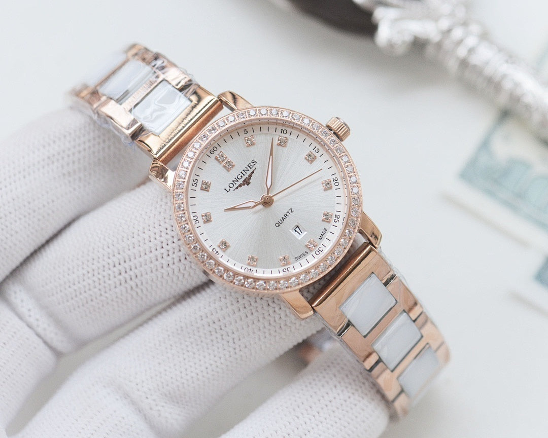 Wristwatch with rose-gold case and two-tone link bracelet, white crystal bezel dial