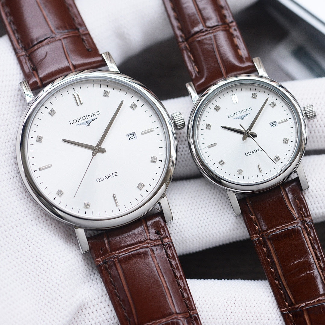 Longines watch with white dial, silver-tone case, brown leather strap, quartz hour markers.