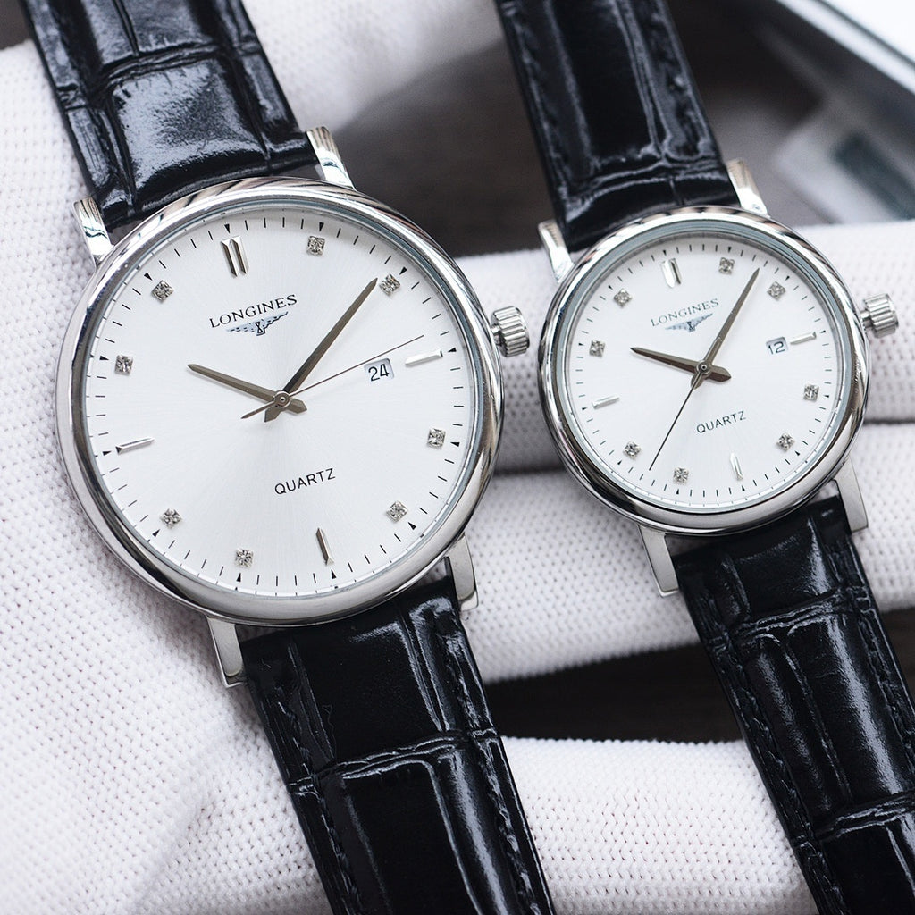 Longines watch with white dial, gold hour markers, black leather strap, silver-tone case.
