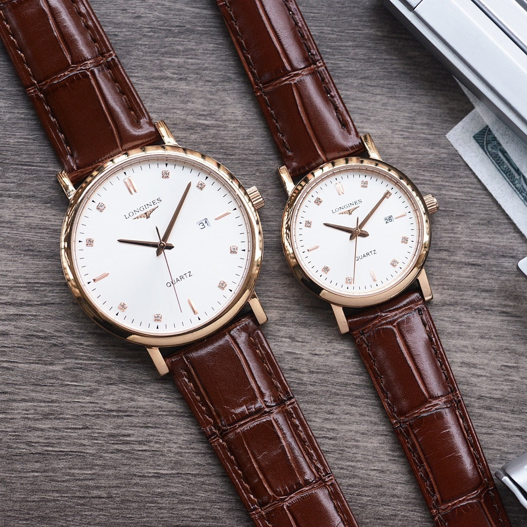 Longines watch pair with white dials, brown leather straps, gold-tone cases, quartz labels.