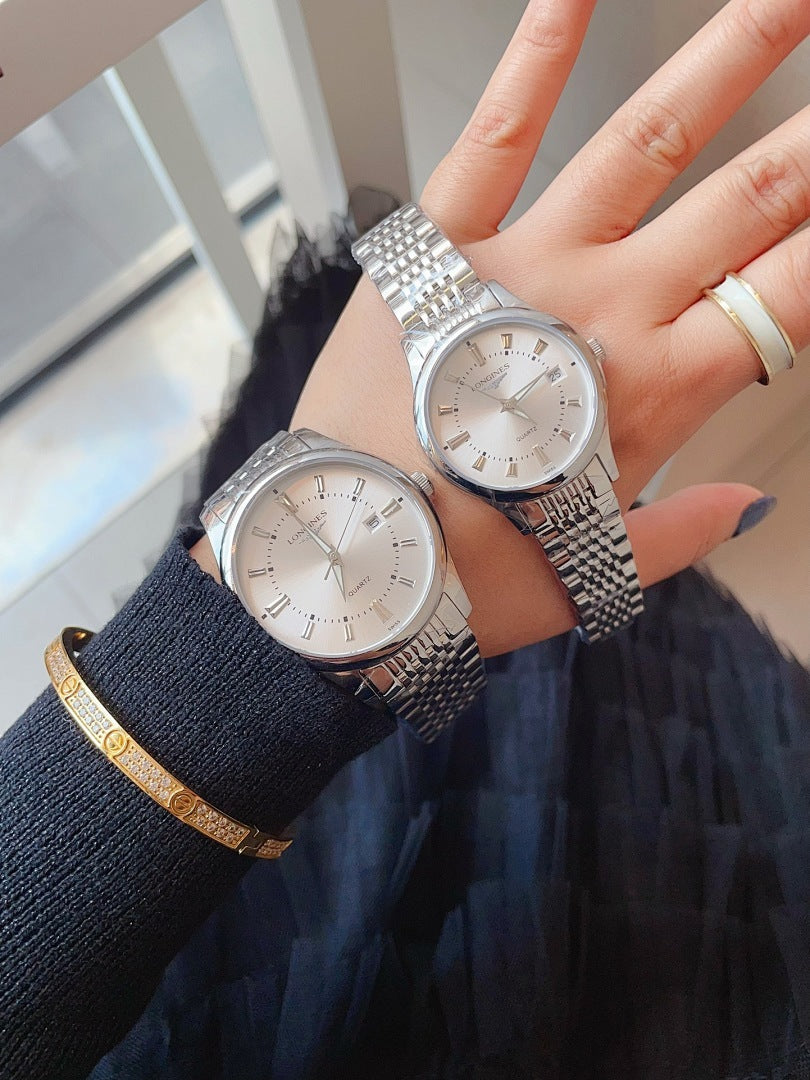 Longines wristwatch, white dial with steel link bracelet, worn together.