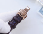 Longines wristwatch clasp view with brown leather strap and metal buckle