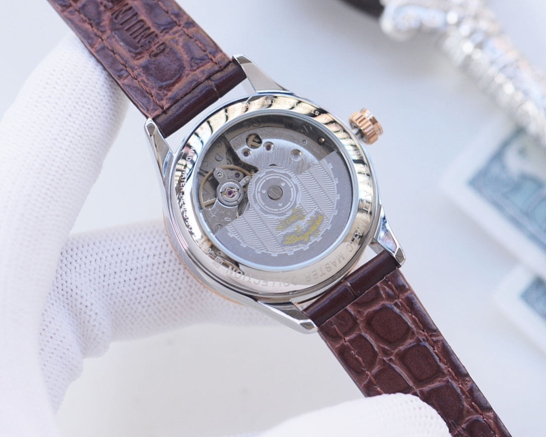 Longines watch caseback view with brown leather strap and exposed silver movement
