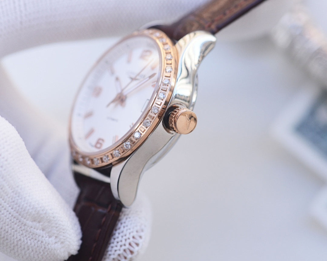 Longines wristwatch side view with brown leather strap and jeweled bezel